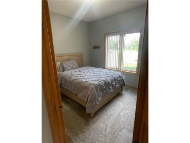 Great chance to own a rambler style end unit in a 55+ community on The Ponds Golf Club in Minnesota - for sale on GolfHomes.com, golf home, golf lot