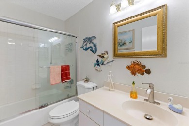 As you enter the enclosed entryway and step into the foyer the on Scepter Golf Club in Florida - for sale on GolfHomes.com, golf home, golf lot