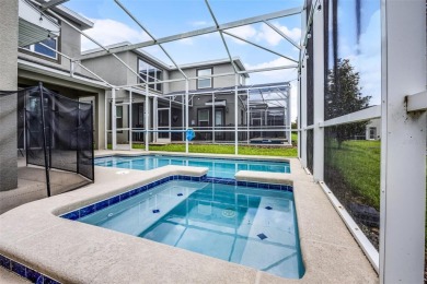 Step into resort-style living at 661 Drop Shot Drive, a on The Oasis Club at Champions Gate in Florida - for sale on GolfHomes.com, golf home, golf lot