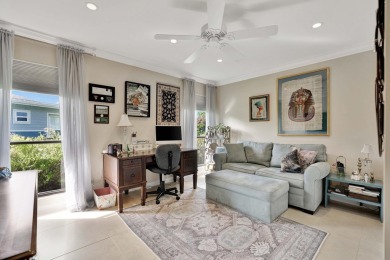 This stunning home boasts a bright and expansive great room with on Eastpointe Country Club in Florida - for sale on GolfHomes.com, golf home, golf lot