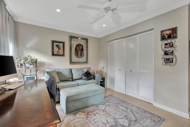 This stunning home boasts a bright and expansive great room with on Eastpointe Country Club in Florida - for sale on GolfHomes.com, golf home, golf lot