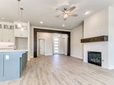 Enjoy this modern, open floor plan with the latest in upgrades on Golf Club At Surrey Hills in Oklahoma - for sale on GolfHomes.com, golf home, golf lot