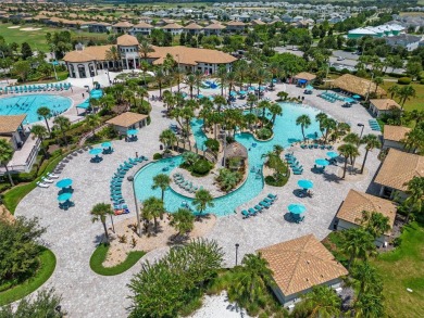Step into resort-style living at 661 Drop Shot Drive, a on The Oasis Club at Champions Gate in Florida - for sale on GolfHomes.com, golf home, golf lot