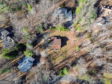 Welcome to 455 Tamarack Drive, a light-filled mountain retreat on Bent Tree Golf Course in Georgia - for sale on GolfHomes.com, golf home, golf lot