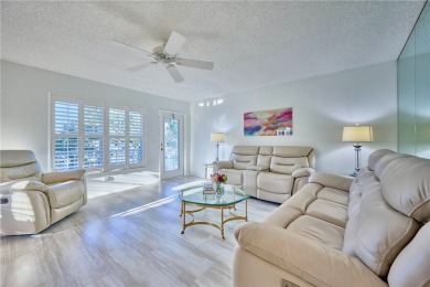 Turnkey 2nd Fl /2BR/2BA Condo /GOLF & WATER VIEWS. Welcome to on The American Golf Club in Florida - for sale on GolfHomes.com, golf home, golf lot