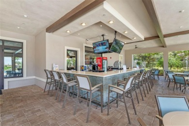 Step into resort-style living at 661 Drop Shot Drive, a on The Oasis Club at Champions Gate in Florida - for sale on GolfHomes.com, golf home, golf lot