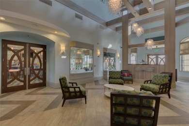 Step into resort-style living at 661 Drop Shot Drive, a on The Oasis Club at Champions Gate in Florida - for sale on GolfHomes.com, golf home, golf lot