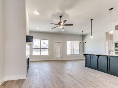 Enjoy this modern, open floor plan with the latest in upgrades on Golf Club At Surrey Hills in Oklahoma - for sale on GolfHomes.com, golf home, golf lot