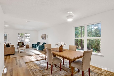 Welcome to this inviting 4-bedroom, 2.5-bathroom home nestled in on Lake Forest Yacht and Country Club in Alabama - for sale on GolfHomes.com, golf home, golf lot