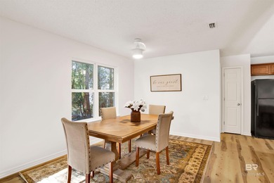 Welcome to this inviting 4-bedroom, 2.5-bathroom home nestled in on Lake Forest Yacht and Country Club in Alabama - for sale on GolfHomes.com, golf home, golf lot