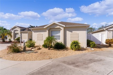 This meticulously maintained 2/2 Block/Stucco WOODLAWN Courtyard on The Links of Spruce Creek in Florida - for sale on GolfHomes.com, golf home, golf lot