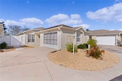 This meticulously maintained 2/2 Block/Stucco WOODLAWN Courtyard on The Links of Spruce Creek in Florida - for sale on GolfHomes.com, golf home, golf lot