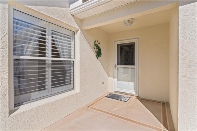 This meticulously maintained 2/2 Block/Stucco WOODLAWN Courtyard on The Links of Spruce Creek in Florida - for sale on GolfHomes.com, golf home, golf lot