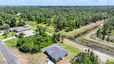 INTERSECTING CANAL VIEWS! You Will Be Amazed By The Quality Of on Mirror Lakes Golf Club in Florida - for sale on GolfHomes.com, golf home, golf lot