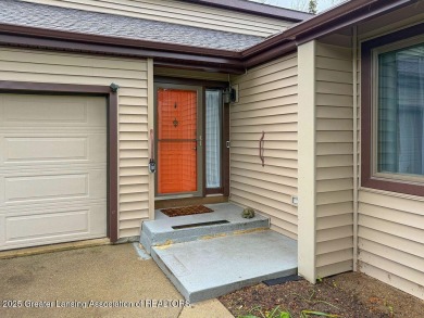 Haslett: Rare offering for this Immaculate 1,700+- sq. ft on Meridian Sun Golf Club in Michigan - for sale on GolfHomes.com, golf home, golf lot