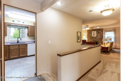 Haslett: Rare offering for this Immaculate 1,700+- sq. ft on Meridian Sun Golf Club in Michigan - for sale on GolfHomes.com, golf home, golf lot