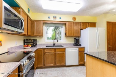 Haslett: Rare offering for this Immaculate 1,700+- sq. ft on Meridian Sun Golf Club in Michigan - for sale on GolfHomes.com, golf home, golf lot
