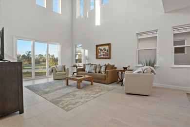 Located in the desirable gated Providence golf course community on Providence Golf Club in Florida - for sale on GolfHomes.com, golf home, golf lot