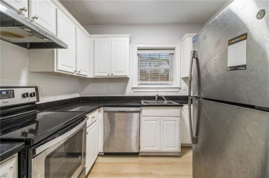 Unbeatable value for a 2BR condo inside the perimeter in this on Alfred Tup Holmes Golf Course in Georgia - for sale on GolfHomes.com, golf home, golf lot