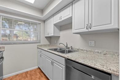 Turn-key 2 BR 2 BA condo in Pinehurst Village. 55+ one-story on The Dunedin Country Club in Florida - for sale on GolfHomes.com, golf home, golf lot