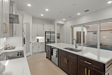 Located in the desirable gated Providence golf course community on Providence Golf Club in Florida - for sale on GolfHomes.com, golf home, golf lot