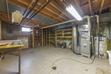 A truly unique find, this Tosi-built home in Cress Creek on Cress Creek Country Club in Illinois - for sale on GolfHomes.com, golf home, golf lot