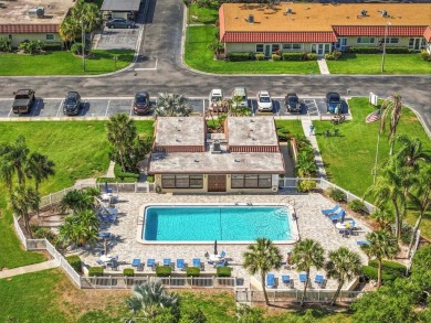 Turn-key 2 BR 2 BA condo in Pinehurst Village. 55+ one-story on The Dunedin Country Club in Florida - for sale on GolfHomes.com, golf home, golf lot