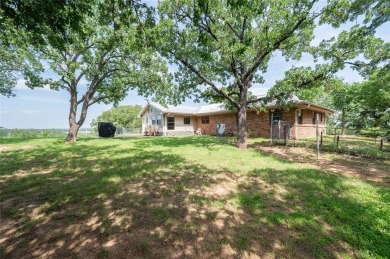 Your dream home awaits overlooking Nocona Lake in the private on Nocona Hills Golf Course in Texas - for sale on GolfHomes.com, golf home, golf lot
