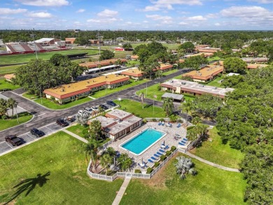 Turn-key 2 BR 2 BA condo in Pinehurst Village. 55+ one-story on The Dunedin Country Club in Florida - for sale on GolfHomes.com, golf home, golf lot