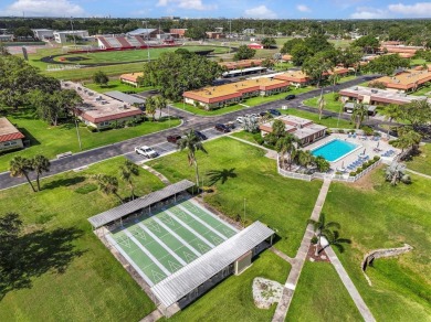 Turn-key 2 BR 2 BA condo in Pinehurst Village. 55+ one-story on The Dunedin Country Club in Florida - for sale on GolfHomes.com, golf home, golf lot
