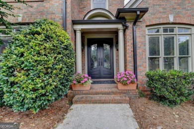 Welcome to this gorgeous 4 bed/3.5 bath 4 SIDE BRICK on Laurel Springs Golf Club in Georgia - for sale on GolfHomes.com, golf home, golf lot