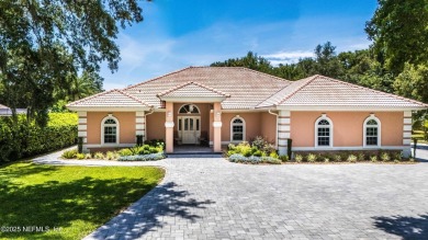 Experience luxury & tranquility in this stunning single-story on Magnolia Point Golf and Country Club in Florida - for sale on GolfHomes.com, golf home, golf lot