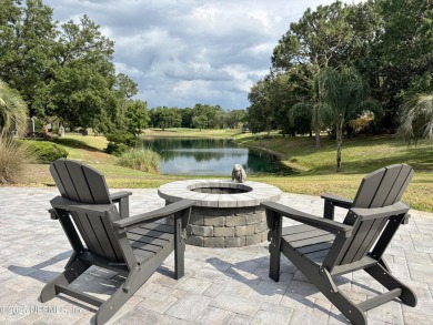 Experience luxury & tranquility in this stunning single-story on Magnolia Point Golf and Country Club in Florida - for sale on GolfHomes.com, golf home, golf lot