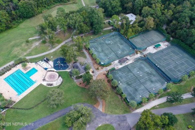 Experience luxury & tranquility in this stunning single-story on Magnolia Point Golf and Country Club in Florida - for sale on GolfHomes.com, golf home, golf lot