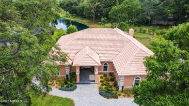 Experience luxury & tranquility in this stunning single-story on Magnolia Point Golf and Country Club in Florida - for sale on GolfHomes.com, golf home, golf lot