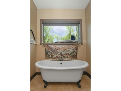 Come home to 781 Crooked Tree Lane, an exquisite, executive on Dakota Dunes Country Club in South Dakota - for sale on GolfHomes.com, golf home, golf lot