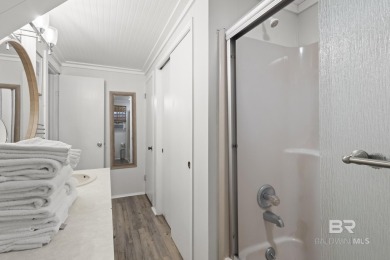 Cute, well-maintained, and updated 2-bedroom home is located on Kiva Dunes Golf Club in Alabama - for sale on GolfHomes.com, golf home, golf lot