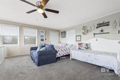 Cute, well-maintained, and updated 2-bedroom home is located on Kiva Dunes Golf Club in Alabama - for sale on GolfHomes.com, golf home, golf lot