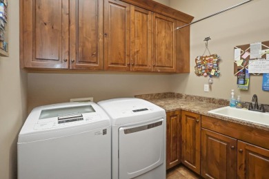 Come home to 781 Crooked Tree Lane, an exquisite, executive on Dakota Dunes Country Club in South Dakota - for sale on GolfHomes.com, golf home, golf lot