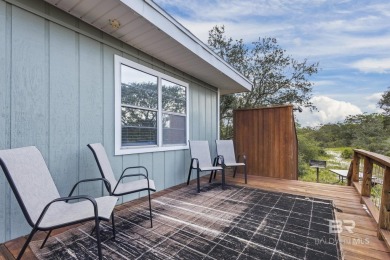 Cute, well-maintained, and updated 2-bedroom home is located on Kiva Dunes Golf Club in Alabama - for sale on GolfHomes.com, golf home, golf lot