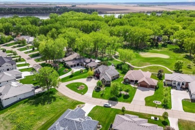 Come home to 781 Crooked Tree Lane, an exquisite, executive on Dakota Dunes Country Club in South Dakota - for sale on GolfHomes.com, golf home, golf lot
