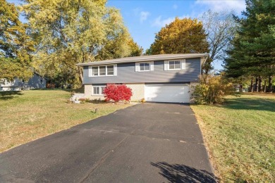 Showings resume Monday, 12/16. This raised ranch is a must-see! on Foxboro Golf Club in Wisconsin - for sale on GolfHomes.com, golf home, golf lot