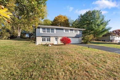 Showings resume Monday, 12/16. This raised ranch is a must-see! on Foxboro Golf Club in Wisconsin - for sale on GolfHomes.com, golf home, golf lot