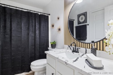 Enjoy a crisp morning sipping your morning coffee and watching on Tan-Tar-A Golf Club in Missouri - for sale on GolfHomes.com, golf home, golf lot