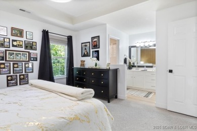 Enjoy a crisp morning sipping your morning coffee and watching on Tan-Tar-A Golf Club in Missouri - for sale on GolfHomes.com, golf home, golf lot