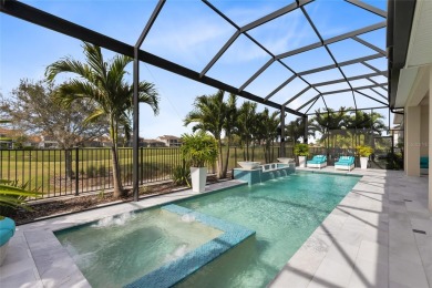 Welcome to an architectural gem in the esteemed Eagle Creek on Eagle Creek Golf Club in Florida - for sale on GolfHomes.com, golf home, golf lot