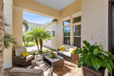 Welcome to an architectural gem in the esteemed Eagle Creek on Eagle Creek Golf Club in Florida - for sale on GolfHomes.com, golf home, golf lot
