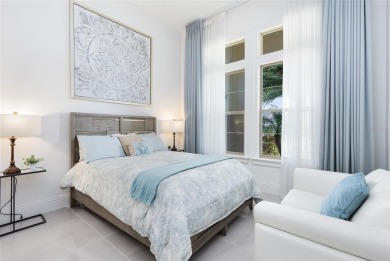 Welcome to an architectural gem in the esteemed Eagle Creek on Eagle Creek Golf Club in Florida - for sale on GolfHomes.com, golf home, golf lot