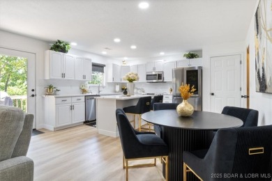 Enjoy a crisp morning sipping your morning coffee and watching on Tan-Tar-A Golf Club in Missouri - for sale on GolfHomes.com, golf home, golf lot