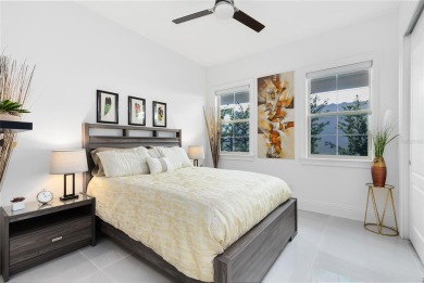 Welcome to an architectural gem in the esteemed Eagle Creek on Eagle Creek Golf Club in Florida - for sale on GolfHomes.com, golf home, golf lot